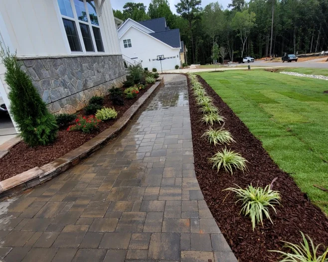 hardscape and shrub installation for residence